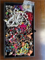 Beads and broken jewelry pieces