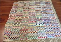 Hand stitched patchwork quilt