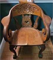 ORNATE OAK CARVED ARM CHAIR WITH BALL AND CLAW