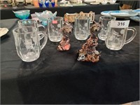 Wolf cups and statues