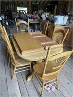 claw foot oak table, 2 leafs, 8 chairs,