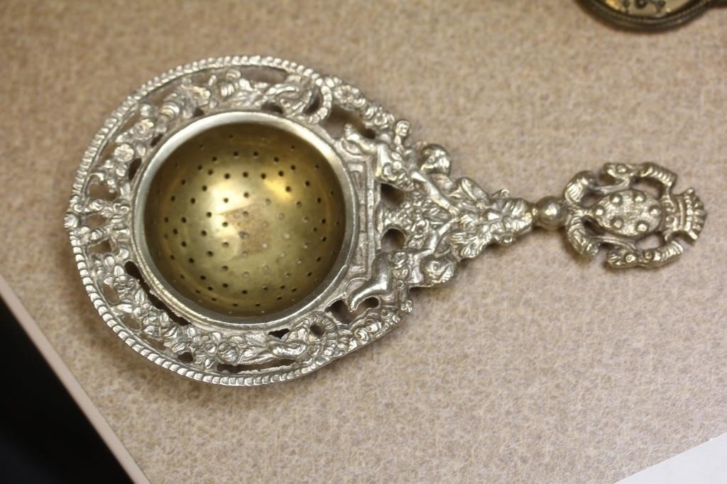 Ornate Silverplate Tea Strainer