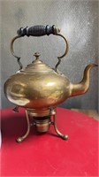 Antique brass tea kettle pot with an ebony wood