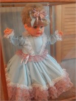 Baby Doll in Glass Case