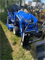 New Holland, workmaster 255. It was purchased in