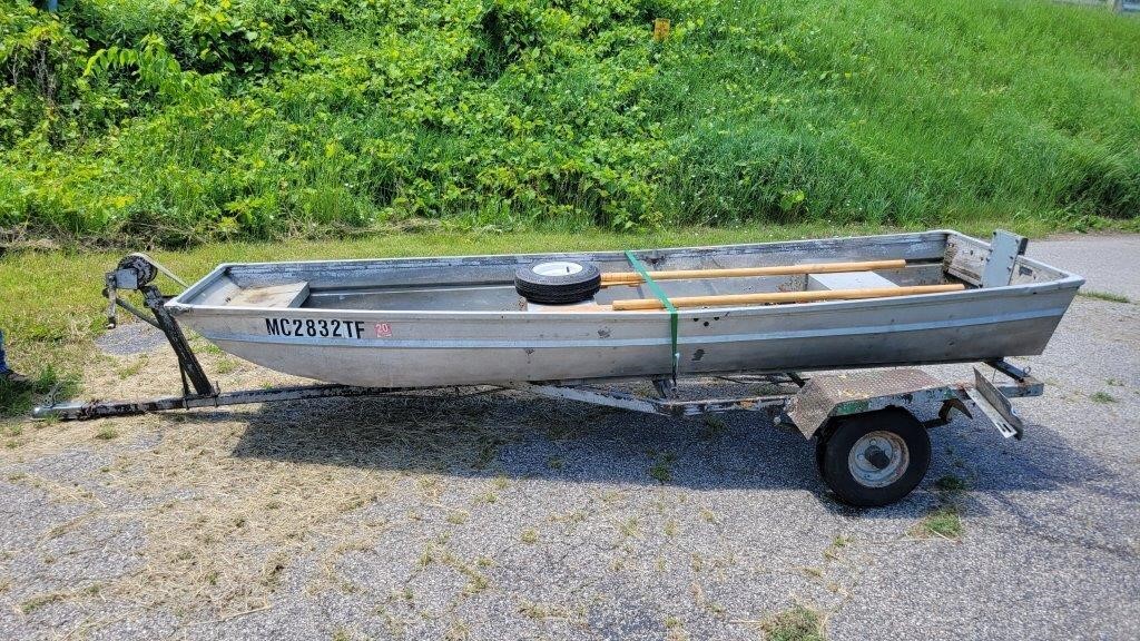 Aluminum fishing boat and trailer 12 ft.