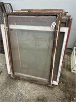 14 antique windows in wood frames. Various sizes