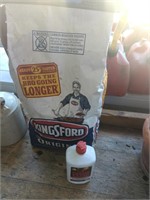 Bag of Kingsford charcoal and charcoal fluid