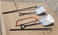 Scoop shovels pruning saw hoe  rake.