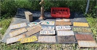 License plates, wooden lamp, ammo box