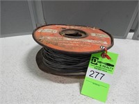 Partial spool of electric fence wire