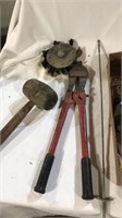 Mallet, grinde wheel, bolt cutter, plyers