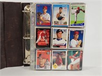 BINDER FULL OF ASSORTED BASEBALL CARDS