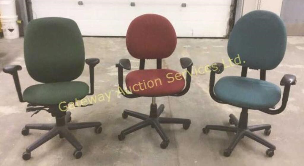 Three office chairs.