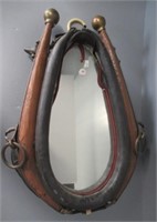 Vintage horse collar mirror. Measures: 21" Tall.