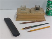 Vintage inkwells and pens