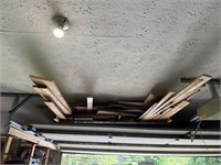 Assorted wood above garage door