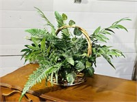 artificial plant in wicker basket