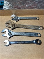 Three crescent wrenches, and one gear wrench
