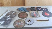 Assortment of saw blades and grinder discs