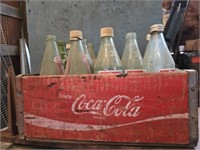 Vintage Coca-Cola wood crate with bottles