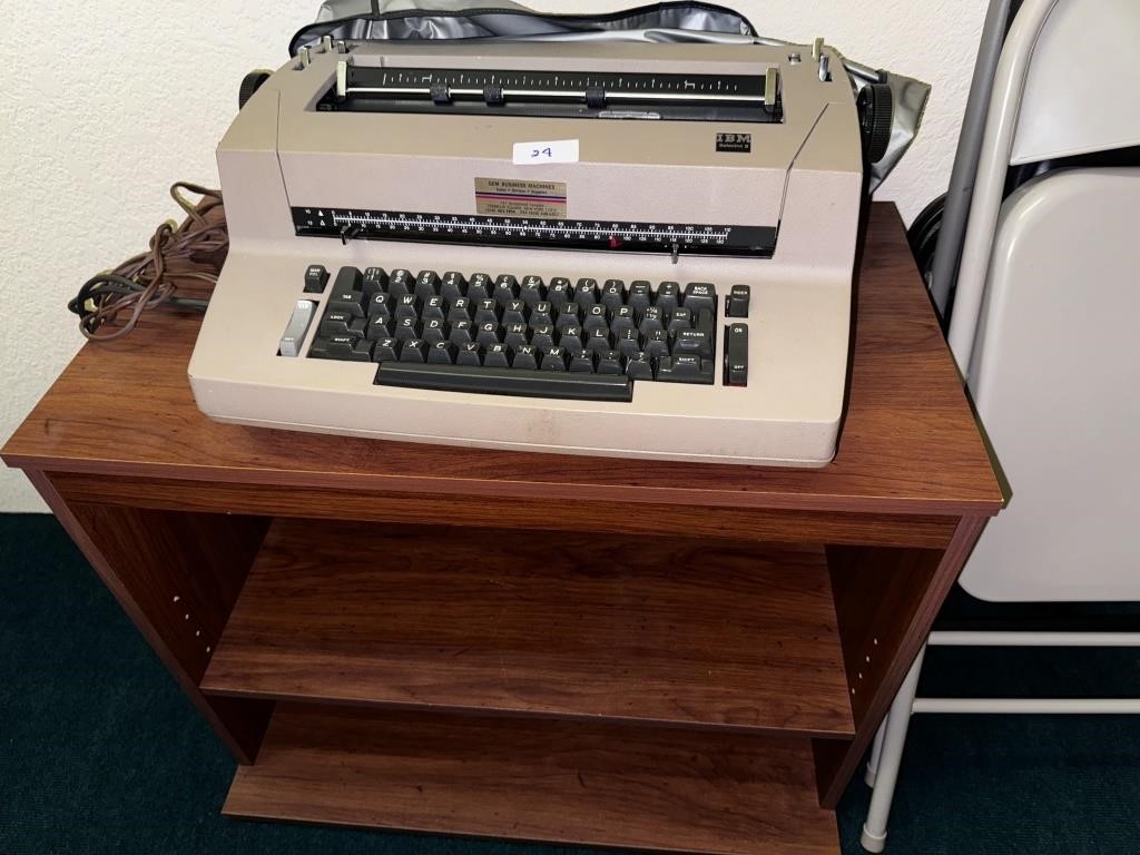 OLD TYPEWRITER AND TABLE