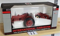 International IH 300 with plow in box