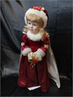 Vintage 1999 X mas Doll.Brand new the heritage