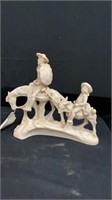 8.5”  Cowboy carved statue has small chip