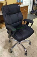 Nice black cushion padded swivel armchair with