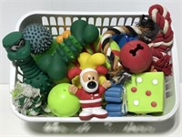Gently used basket of dog toys