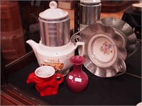 Four pottery items including a coffeepot with