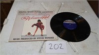 THE WOMAN IN RED RECORD
