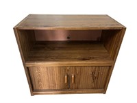 An Oak TV Cabinet 28"H x 30"W x 15.5"D