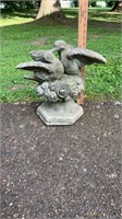 Concrete bird statue