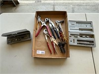 electrrical tester, pliers, pipe wrench, bits