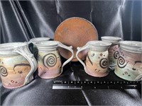 Six (6) Stoneware Pottery Mugs & Trivet Signed $$$