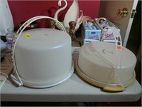 Two Tupperware cake carriers