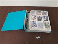 Baseball cards in large binder