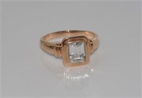 9ct rose gold ring with good emerald cut CZ