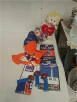 Group of Boise State items include slippers flag