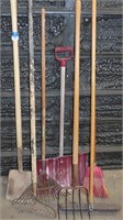 2 shovels, pitchfork, 2 rakes, 2 brooms