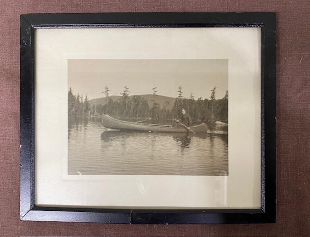 Old Photo of Man in Canoe