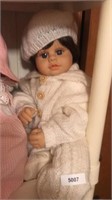 Doll w sweater and hat