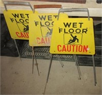(3) Caution Wet Floor signs.