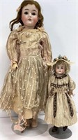 Antique dolls (2)  in original silk clothing, 24