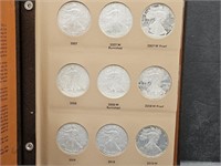 Book of 27 American Silver Dollar Coins