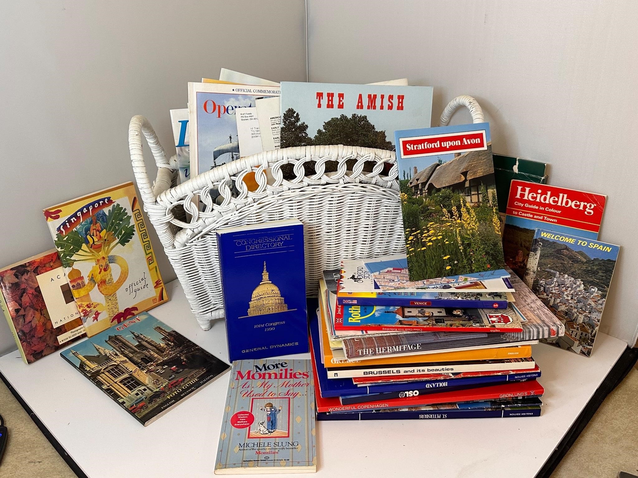 Wicker magazine rack with travel books