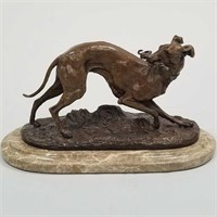P.J. Mene bronze of a greyhound with whip in mouth
