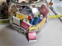 Bowl of old match packs